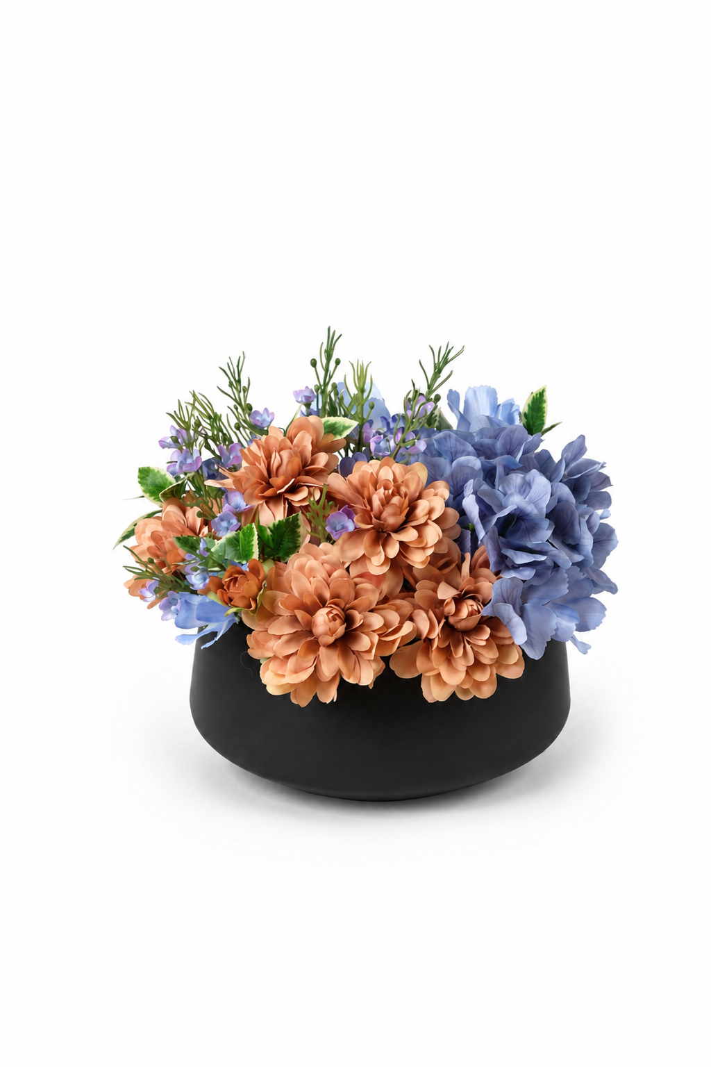 Peach and blue artificial flower arrangement in a black bowl