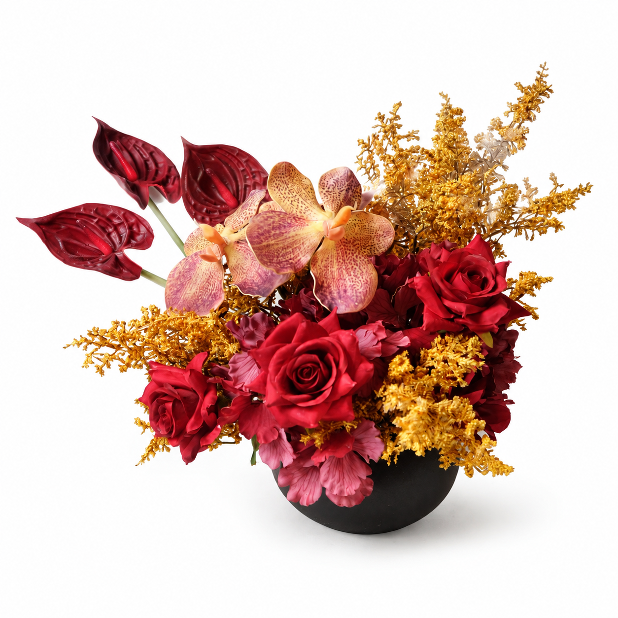 Red and gold artificial flower arrangement in a black bowl